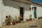 Humble house with flower pots at Evoramonte