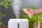 Humidifier and thermometer measuring the optimum temperature and humidity in a house, apartment or office, a photo for articles
