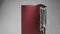 Humidor refrigerator with glass doors turns at grey wall