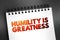 Humility Is Greatness text on notepad, concept background