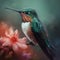 hummingbird perched on a blooming flower