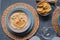 Hummus chickpea served on a plate with dipping toasts