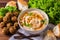 Hummus, falafel and chickpea served with salad and pita