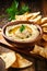 Hummus and flatbreads on the table. Selective focus.