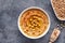 Hummus Israel dip paste close up with paprika, tahini, and olive oil, healthy diet natural vegetarian snack