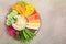 Hummus platter with assorted vegetable snacks. Healthy vegan and vegetarian food.