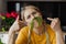 Humor healthy food conceptual photo, Funny young woman using dill as mustache in kitchen, vegetable dieting, lifestyle