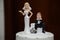 Humorous Ball and Chain Wedding Cake Topper Close-up