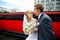 Humorous picture bride and groom on red limo