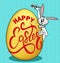 humorous picture on Easter. Rabbit paints an egg with a greeting