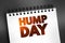 Hump Day text on notepad, concept background