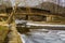 Humpback Covered Bridge Over a Frozen Stream