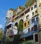 Hundertwasser House, Wien Artist`s creation of brightly painted, natural apartment block with a forested roof & balconies