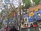 Hundertwasser House, Wien Artist`s creation of brightly painted, natural apartment block with a forested roof & balconies