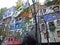 Hundertwasser House, Wien Artist`s creation of brightly painted, natural apartment block with a forested roof & balconies