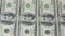 Hundred dollar bills in a row. Macro photography of banknotes. Portrait of Benjamin Franklin.