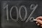 Hundred  percent written on a blackboard