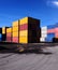 Hundreds of containers stacked on piles