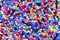 Hundreds of multicoloured plastic beads.