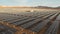 Hundreds solar energy panels rows along the dry lands at Atacama Desert, Chile. Huge Photovoltaic PV Plant in the middle of the