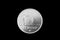 Hungarian 10 Forint coin isolated on a black background