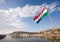 The Hungarian flag over river Danube.