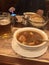 Hungarian goulash and beer. Christmas street in Sopron in Hungary, evening walk for the new year, lights and restaurants, ancient