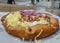 Hungarian langos topin with mozzarella cheese and onion quick food during touristic visit