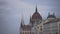 Hungarian Parliament architecture against cloudy sky