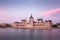 The Hungarian Parliament on the Danube riverbank at nightfall