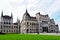 The Hungarian Parliament with the main dome and stone neo gothic stone elevation