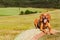 Hungarian pointer lies on a haystack. Agricultural work on pasture in the Czech Republic. Rest after work.