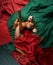A Hungarian Vizsla reclines in a cozy nest of red and green blankets, eyes full of gentle warmth
