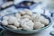 Hungarian words engraved in small river stones in a bowl