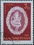 Hungary circa 1960: A post stamp printed in Hungary showing an ornate white halas lace work depicting a girl against a red backgro