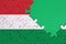 Hungary flag is depicted on a completed jigsaw puzzle with free green copy space on the right side