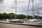 Hungary, Lake Balaton, 06/03/2016. Sailing yachts moored in the picturesque marina. Cloudy bright sky, turquoise water