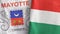 Hungary and Mayotte two flags textile cloth 3D rendering