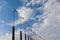 Hungary National Flag Waving on pole against deep blue sky background