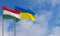 Hungary and Ukraine flags. Blue sky and flag Hungary and Ukraine. 3D work and 3D image