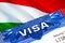 Hungary Visa in passport. USA immigration Visa for Hungary citizens focusing on word VISA. Travel Hungary visa in national