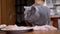 Hungry British Cat Sits On Table, Licks Mouth, Wants To Steal Chicken Fillet