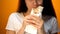 Hungry girl eating shawarma, enjoying delicious but unhealthy food, addiction