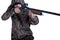 Hunter in camouflage clothing with a gun on white background isolated. The man with the shotgun. Young guy in a camo suit with a