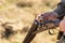 Hunter equips the retro double-barreled shotgun with cartridges, close up. Hunting season