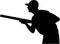 Hunter holding a gun, silhouette