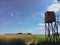 Hunter lookout tower in a field