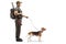 Hunter standing with a rifle and a beagle dog on a leash