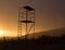 Hunting tower silhouette in sunset