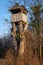 Hunting tree stand on the remains of a big tree